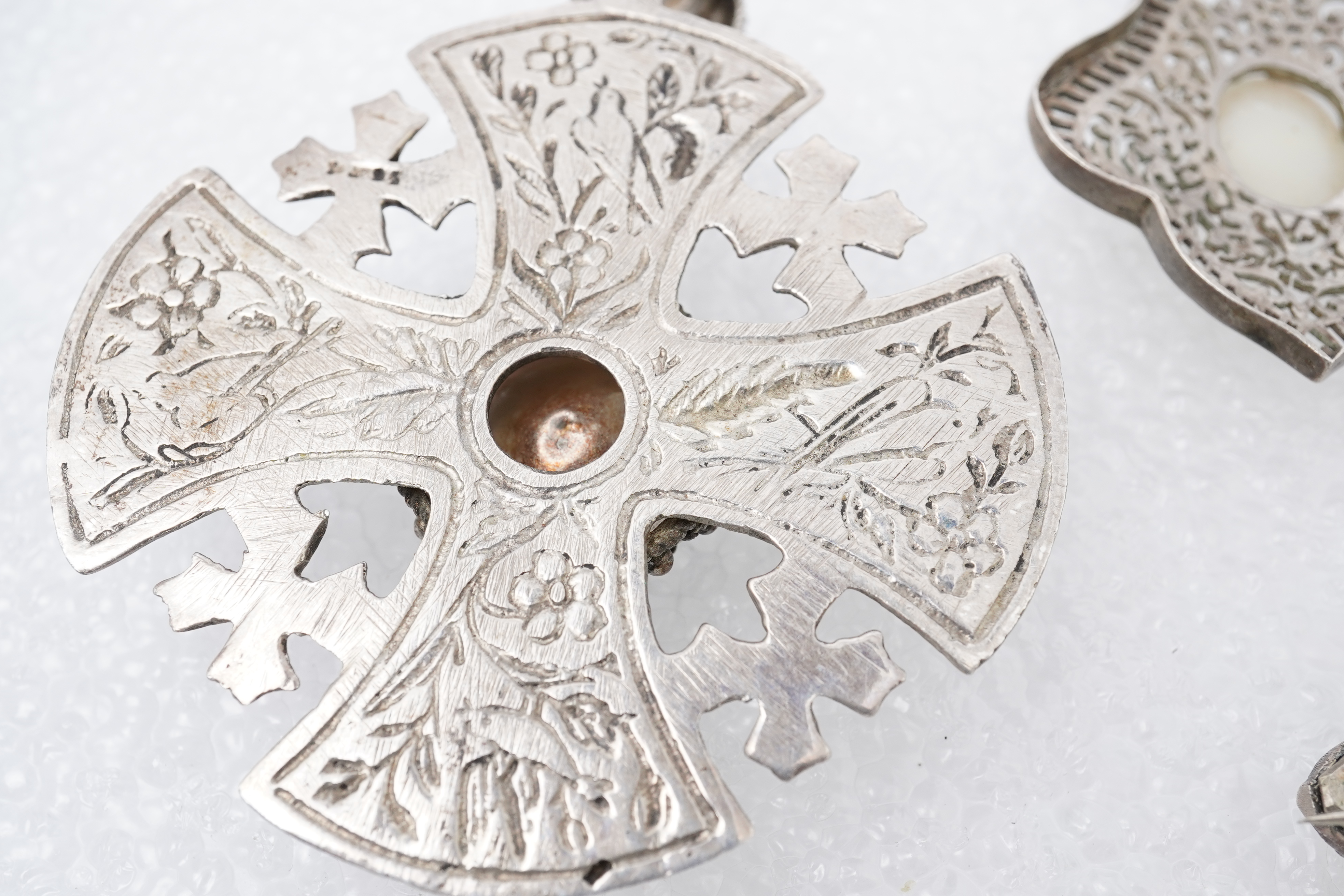 A group of jewels, comprising: a late 19th century and later Renaissance revival-style pendant set with an oval turquoise cabochon, circular-cut garnets and circular-cut green chalcedony, mounted in silver, length 6cm, s